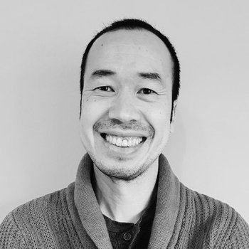 Viet looking into camera and smiling